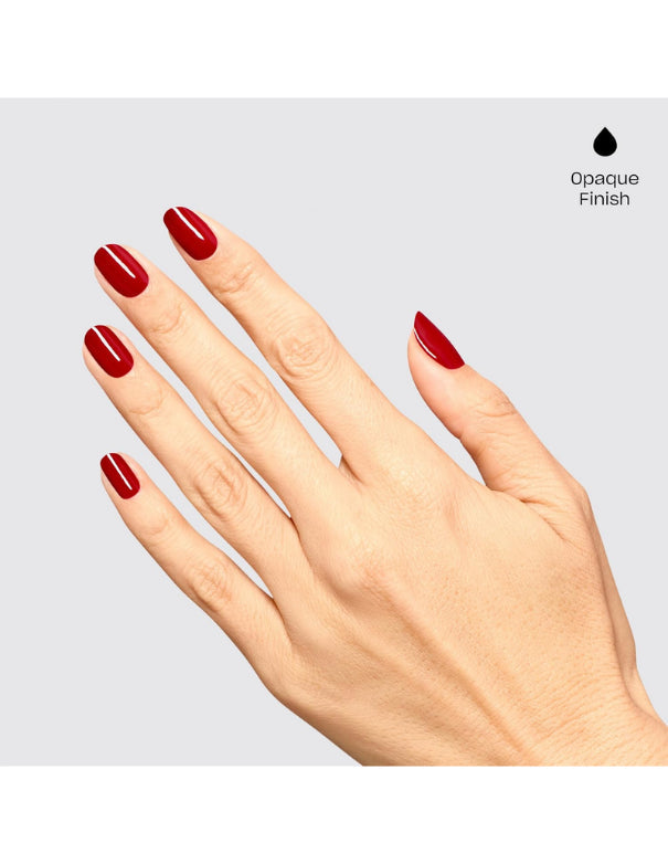 A hand with neatly manicured nails painted in a deep opaque red polish, shown against a light gray background with a small black droplet icon and the text 'Opaque Finish' in the top right.
